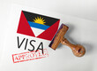 Antigua and Barbuda Visa Approved with Rubber Stamp and flag
