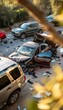Top view of a dangerous car crash, displaying a severe accident scene on the road