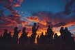 Outdoor Prayer Gathering Silhouetted at Sunset