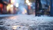 Snowfall in the city at night. Blurred image of street with lights