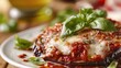 Baked aubergine with mozzarella cheese and tomato sauce
