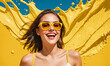 Happy smiling excited young beautiful woman on summer yellow fluid background