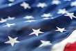 Fragment of a fluttering American flag. Flag of USA background.