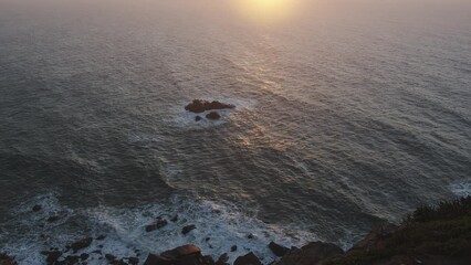Wall Mural - beautiful sunset in the atlantic ocean at cape cabo da roca, portugal. the westernmost point of euro
