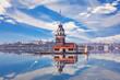 The Maiden's Tower and its reflection in the Bosphorus, Istanbul, Turkey
