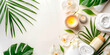 spa background banner wellness and spa composition with towels, candle, tropical leaves and orchid flowers on white background