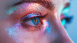 close up of woman with shining eye and glitter makeup on the face
