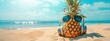 Pineapple with sunglasses and headphones on the beach