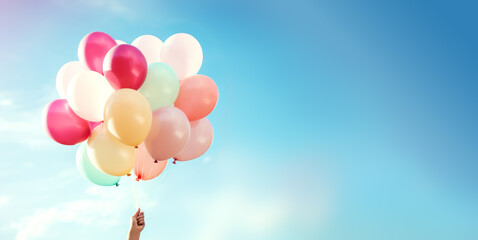 Poster - Colorful balloons held against a clear blue sky, evoking freedom and happiness. Generative AI