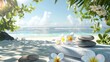 A white towel with frangipani flowers and balanced stones on a tropical beach background of the sea, on a sunny day