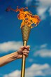 Low Angle Perspective: Elite Athlete with Torch