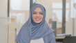 © stockbakers - Portrait of Smiling Arab Woman in Hijab