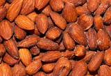 Fototapeta  - close up with many roasted and salted almonds
