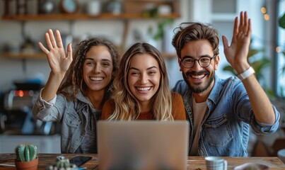 Wall Mural - A community of happy people sitting around a table, sharing a fun moment with smiles and gestures while looking at a laptop computer