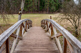 Fototapeta Tęcza - The boardwalks leading to the Vilce Nature Park. Latvia. Wooden walkway in early spring.