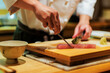 Poster with sushi chef preparing sashimi, traditional Japanese restaurant, fresh and delicious traditional cuisine