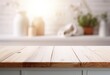 Empty wooden table top with blurred white laundry room interior background for product display montage