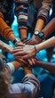 © Natalia - Diverse group of people stacking hands in a symbol of unity