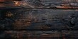 Close-up of dark stained wooden planks with rich textures and patterns.