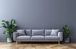 Modern grey sofa against gray wall with copy space and plant on wooden floor, mock up for home interior design 