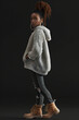Stylish Urban Fashion Model in Knitwear Showcasing Contemporary Outfit - Banner