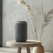A smart speaker sits on a wooden stool