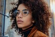 Eyewear fashion trends for both style and function. African woman in trendy eyeglasses