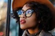 Eyewear fashion trends for both style and function. African woman in trendy eyeglasses