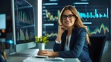 Fototapeta  - Businesswoman enjoy sitting at computer desk, analyzing business data, lead to success