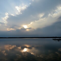 Sticker - Serene lake reflecting the cloudy sky above. Lake Conroe, Texas