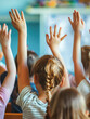 Questions, teacher or education at school with kids hands raised to answer English language assessment. Classroom, learning or tutor teaching summary information to smart and clever group of children