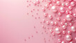 pink mother of pearl pearls on a pink background with copy space