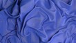 © Alexander Mils/Stocksy - Royal Blue Textile Close-Up