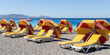 Chairs and umbrellas at a beautiful beach in Greece beach