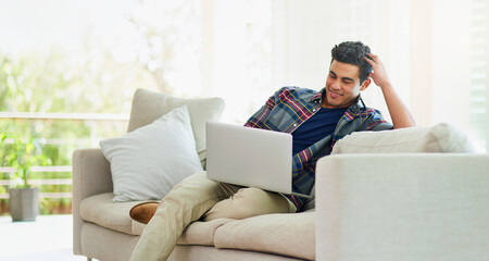 Poster - Man, laptop and sofa for internet search in home for streaming entertainment, subscription or movie. Male person, couch and relax weekend in apartment for watching film in house, media or networking