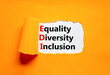 EDI equality diversity inclusion symbol. Concept words EDI equality diversity inclusion on white paper on beautiful orange background. Business EDI equality diversity inclusion concept. Copy space.