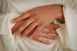 © Abigail Tulenko/Stocksy - Closeup Hands with White Sweater