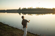 © Lupe Rodríguez/Stocksy - man with down syndrome next to a river in nature