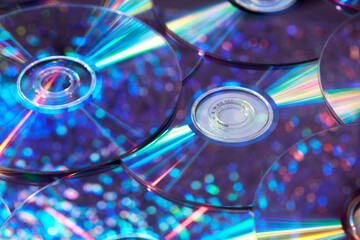 Water drop bokeh on compact CD discs refracting multicolor light