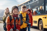 Fototapeta  - A joyful schoolchild by the school bus: a moment capturing the excitement and anticipation of a young student as they embark on their educational journey.