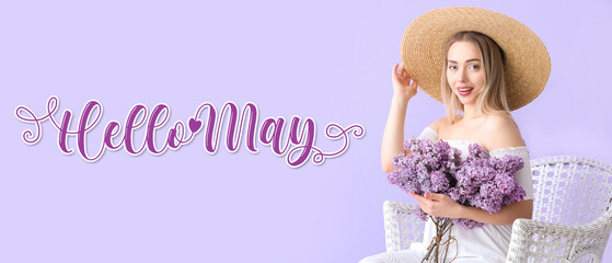 Sticker - Young woman with lilac flowers in armchair on color background