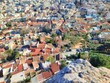 A panoramic view of Athens, Greece from the top of the Acropolis hill.