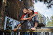 © Jovo Jovanovic/Stocksy - Affectionate couple enjoying on balcony in log cabin