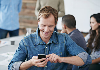 Aufkleber - Happy man, phone and typing with meeting for social media, communication or networking in boardroom at office. Young male person with smile on mobile smartphone for online chatting, texting or app