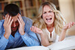 © peopleimages.com - Frustrated couple, headache and argument with drama in house for marriage problems, conflict and toxic relationship in lounge with man, woman and therapy for counseling and advice for divorce