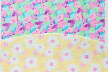 Poster - material with heart prints and felt with floral pattern