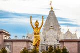 Fototapeta Nowy Jork - Statue of Nilkanth Varni with Akshardham Mahamandir temple in the back