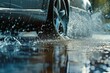 Capturing the dynamic effects of rainy weather with a close-up of car wheels on a wet road