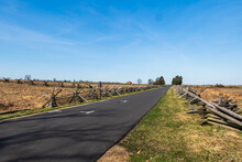 A Two-lane Road In The Gettysburg National Military Park In Gettysburg, Pennsylvania, USA On A Sunny Winter Day
