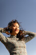© Alba Vitta/Stocksy - Happy dancing womant outdoors